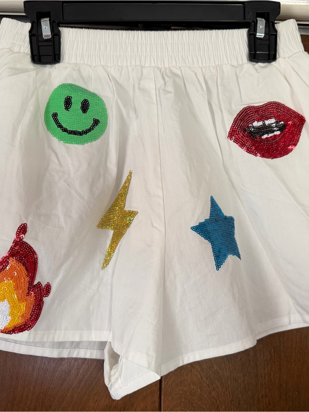 QUEEN OF SPARKLES White Shorts with Multicolor Sequin Patches